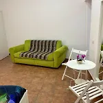 Maison Palu\'